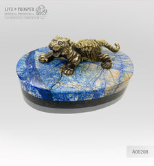 Handmade bronze tiger figure with Swarovski inserts and lapis lazuli plate on a dolerite base