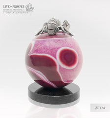 A silver figure of the Zodiac Sign Cancer on an agate sphere and a dolerite plate silver 925  Серебренный Знак зодиака - Рак на сфере из агата на пластине из долерита серебро 925 דמות כסף מזל סרטן על כדור אגת וצלחת דולריט כסף 925