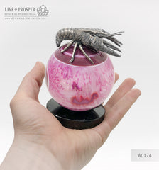 A silver figure of the Zodiac Sign Cancer on an agate sphere and a dolerite plate silver 925  Серебренный Знак зодиака - Рак на сфере из агата на пластине из долерита серебро 925 דמות כסף מזל סרטן על כדור אגת וצלחת דולריט כסף 925